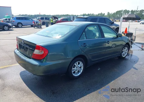 2004 Toyota Camry Le V6/Xle V6 z USA, uszkodzony, nr VIN 4T1BF32K74U073206